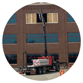 Material for the third and fourth floor build out entered the building through an opened window space