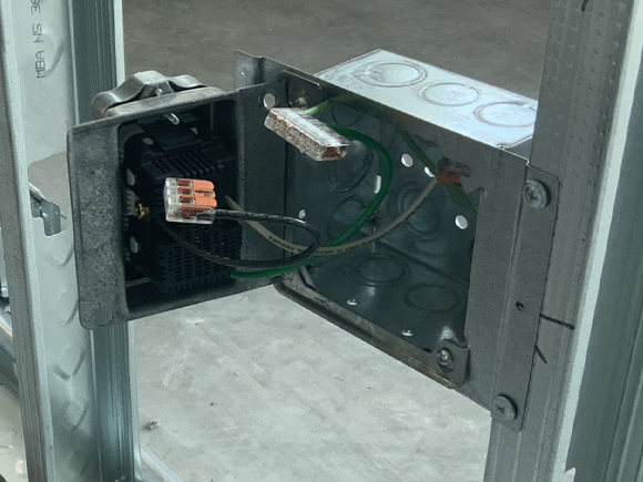 Prefabricated custom hinged box with receptacles and a protective cover